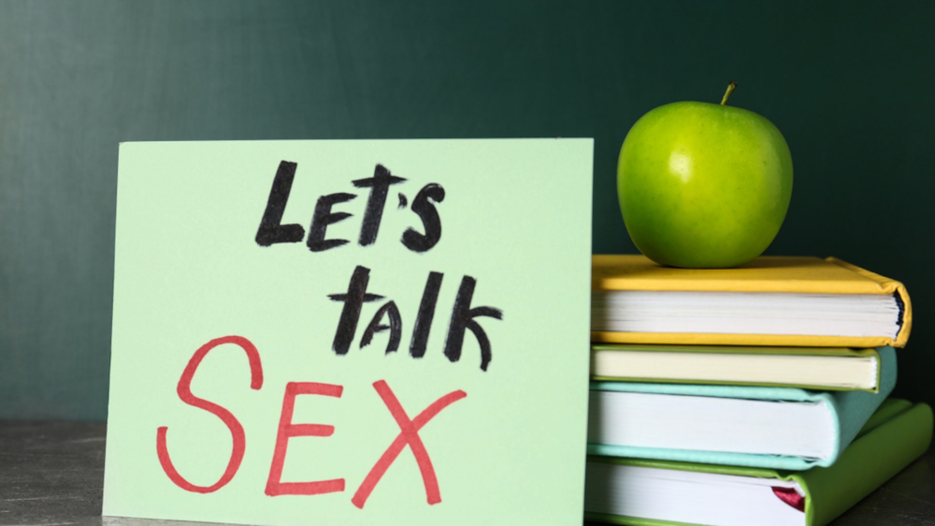 Cedule s nápisem Let¨s talk SEX